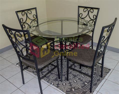 Having a minimum of 2 chairs for regular use and up to 6 extra chairs offers the most flexibility. 4 Piece Dining Table Set for sale in Mandeville Manchester - Furniture