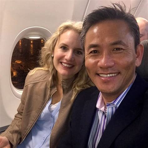 Middle Aged Amwf Couple On The Plane Amwf Amww Asian Blonde Couple Plane Airplane
