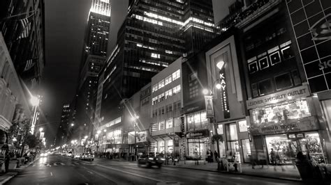 Black And White Picture Of Road Between Lighting Buildings Hd Black