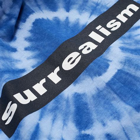 PLEASURES SURREALISM TIE DYE T SHIRT BLUE