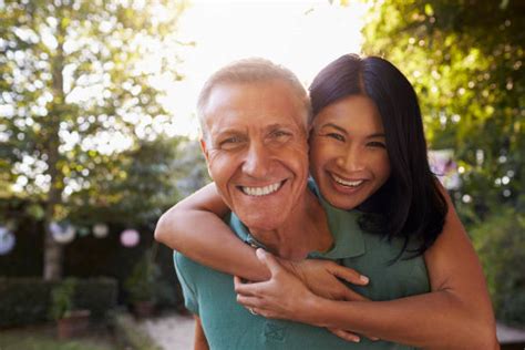 Old Asian Couple Smiling Stock Photos Pictures And Royalty Free Images