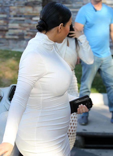 Kim Kardashian Shows Off Her Blossoming Baby Bump As She Joins Kourtney