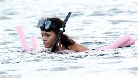 Rihanna Shows Off Her Flawless Figure In A Halter Neck Bikini During A Snorkelling Trip With