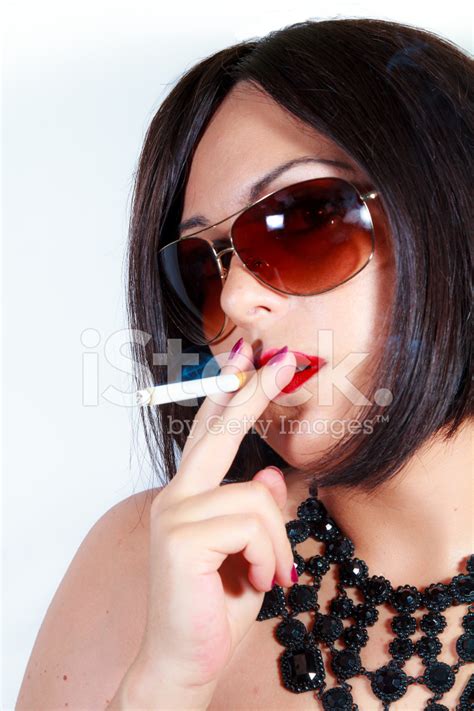 Beauty Woman With Sunglasses Smoking A Cigarette Stock