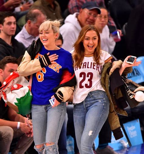 Pin For Later Miley Cyrus Casually Flaunts Her Engagement Ring At A