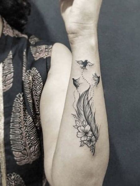 25 Feather Tattoo Designs And Meaning 2023 The Trend Spotter