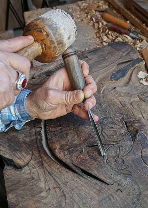 Wood Carving Carver With Chisel And Hammer Stock Photo Image Of