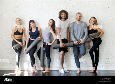Group Portrait Of Young Happy Fitness Instructors Stock Photo Alamy