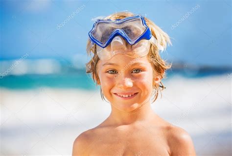 Happy Young Boy At The Beach — Stock Photo © Epicstockmedia 34819051