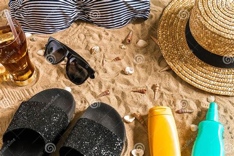 summer bikini and accessories stylish beach set beach bikini summer outfit and sea sand as