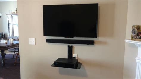 Tv Soundbar And Glass Shelf Installation For A Client In The