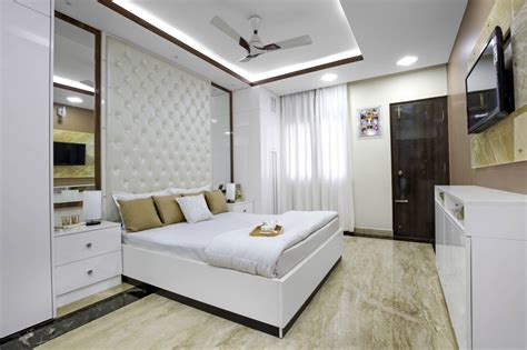 Classic White And Wood Pop Design For Bedroom Livspace