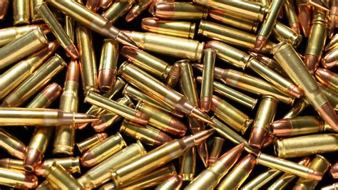 Stock Video Of Closeup Of Assorted Bullets Slowly Rotating 458317