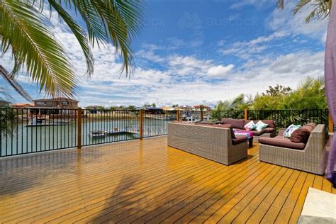 Image Of Outdoor Entertaining Deck Overlooking Private Waterfront