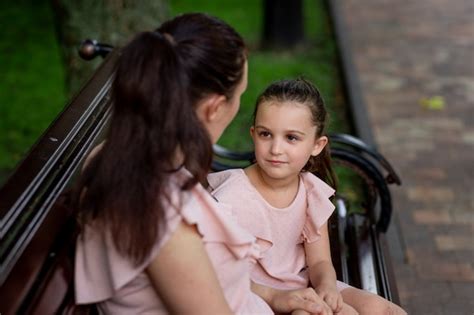 Premium Photo Mother And Daughter 5 Years Old Walking In The Park In The Summer Mother