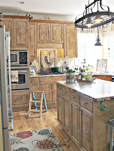 Whitewashed kitchen cabinets back a country or afflicted theme, while aphotic colors improve your kitchen and add abreast address to the space. French Country Kitchen style Freshened up - Debbiedoos