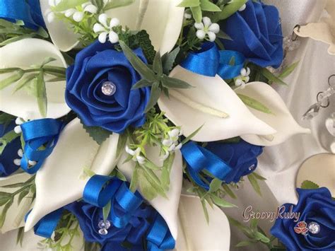 Royal Blue Ivory Rose And Large Calla Lily Added Royal Blue Ribbon Loops