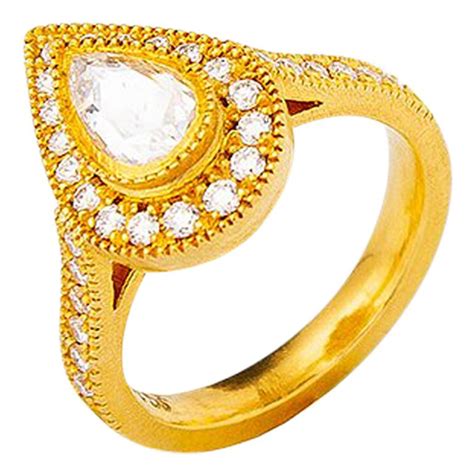 24 Karat Gold Handcrafted Tear Drop Form Rose Cut Diamond Solitaire Ring For Sale At 1stdibs