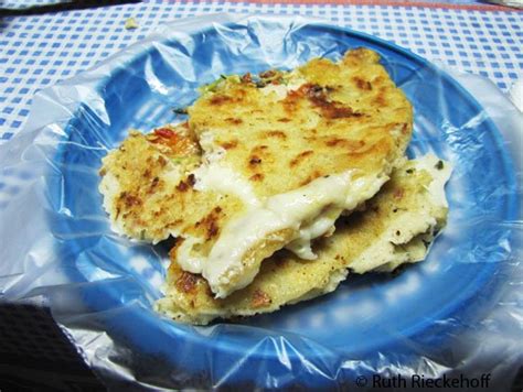 Pupusas (salvadoran stuffed masa flatbread) pupusas are similar to corn tortillas, only thicker and stuffed with cheese, beans or meat. Pieces of my pupusa loca, Ahuachapan, El Salvador - Tanama ...