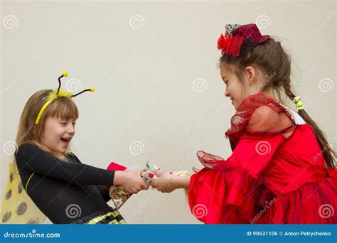 Little Girls Fighting Over A Toy Stock Photo Image Of Game Cute