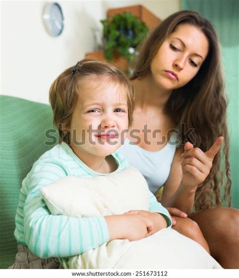 Young Unpleased Mother Scolding Crying Child Stock Photo 251673112
