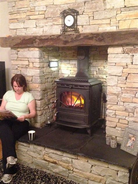 The indoor wood stove project has begun! Image result for elevated wood stove | Wood stove ...