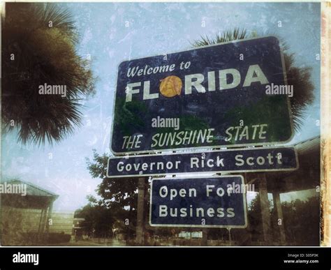Welcome To Florida The Sunshine State Sign At The Floridageorgia