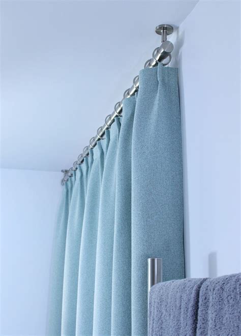 For instance, simply installing a ceiling mount shower curtain rod can make your bathroom look taller. Bathroom Update: Ceiling Mounted Shower Curtain Rod ...