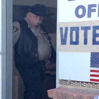 In South Dakota A Law Enforcement Officer Inside The Entry Of A