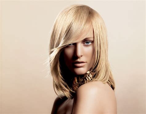 To tell the truth, mid length hair is always in. Medium-length hairstyle with a tapered fringe and inward ...