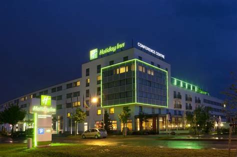 Bathrooms include shower/tub combinations and hair dryers. Holiday Inn Berlin Airport - Conference Centre, Berlin ...