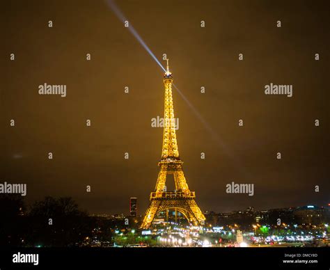 Eiffel Tower And Spotlight At Night Stock Photo Alamy