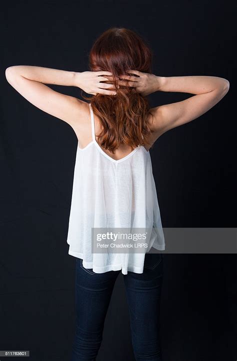 Pretty Female Facing Backwards To Camera Stock Photo Getty Images