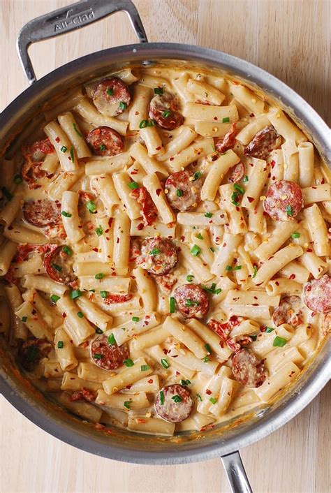 Cook onions, garlic and smoked sausage in a large, deep saute pan and cook until lightly browned. easy recipes with smoked sausage and pasta