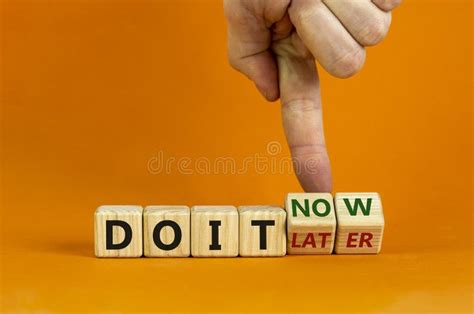 Do It Now Symbol Businessman Hand Turns Cubes And Changes Words `do It