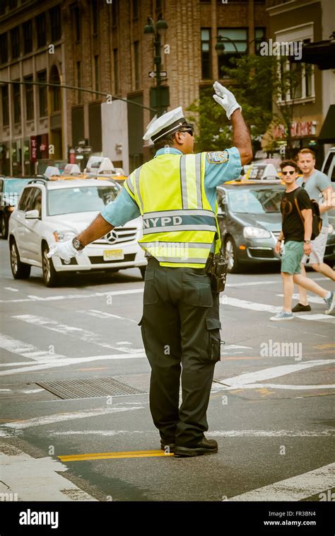 Nypd Traffic Officer Directing Traffic New York City Usa Stock Photo