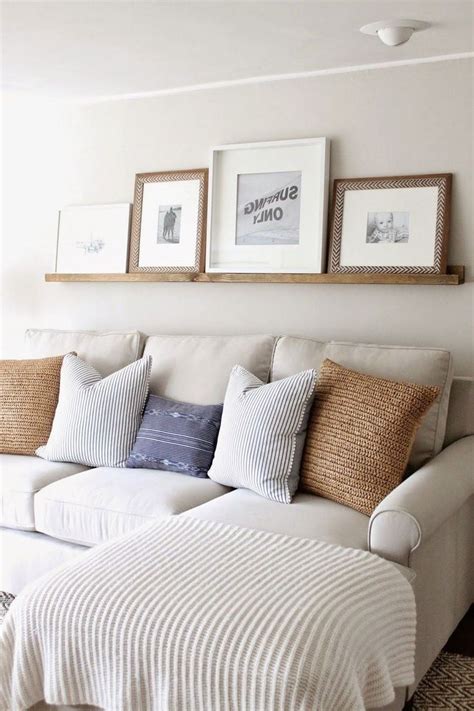 Aside from giving it another dynamic, it also adds a soft glow to the sofa itself, making decorating around it easier. 12 Elegant Farmhouse Home Decor Ideas | Neutral living ...