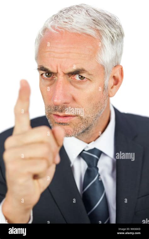 Angry Businessman Pointing His Finger And Looking Stock Photo Alamy