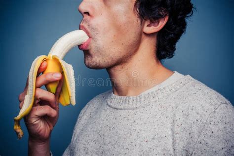 Young Man Eating Banana Stock Image Image Of Health 36025215