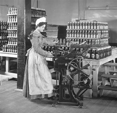 Female Worker Bottling Ketchup At The Original Heinz Factory 1897