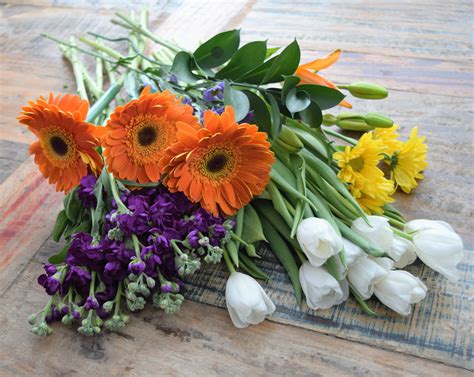 Choose from classic roses, soft lilies and more. How to Arrange Grocery Store Flowers Like a Florist ...
