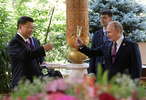 Photos Russias Putin Gives Chinas Xi Ice Cream On His 66th Birthday