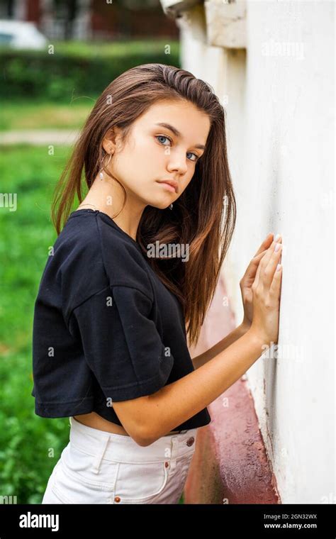 Portrait Of A Young Beautiful Brunette Girl Autumn Park Outdoors Stock