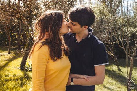 France Couple Kissing In A Natural Environment Outdoors Wedding