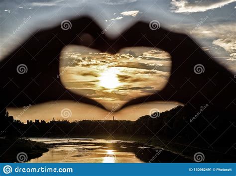 Heart Gesture In Front Of Sunset Above River Romantic Date Ideas Idea