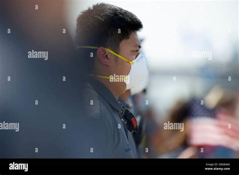 April 20, 2020: A Firefighter with Buda Fire Department waits in place