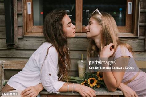 lesbian girls kiss photos and premium high res pictures getty images