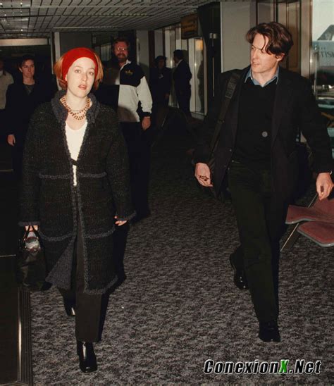 Gillian With Hugh Grant At Heathrow Airport London February 13 1999