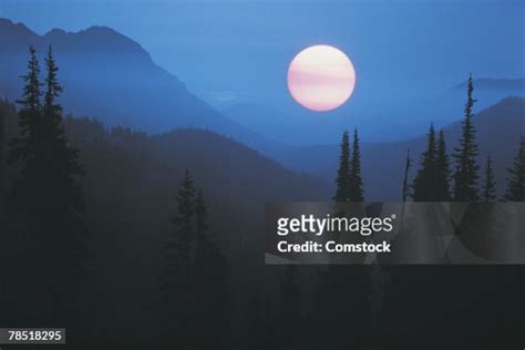 Full Moon Over Mountains High Res Stock Photo Getty Images