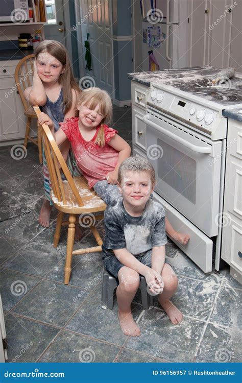 Naughty Children Making Mess In Kitchen Stock Image Image Of Messing